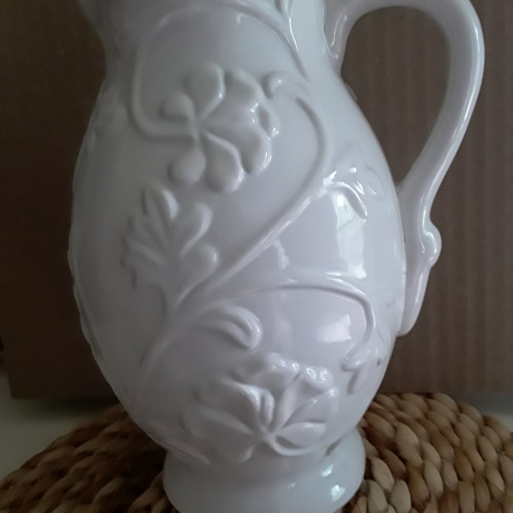 Ceramic Pitcher with Raised Floral Motif